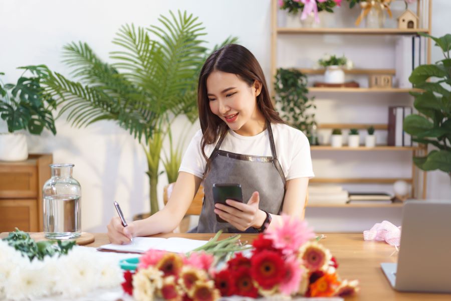 Businesswoman using her smartphone