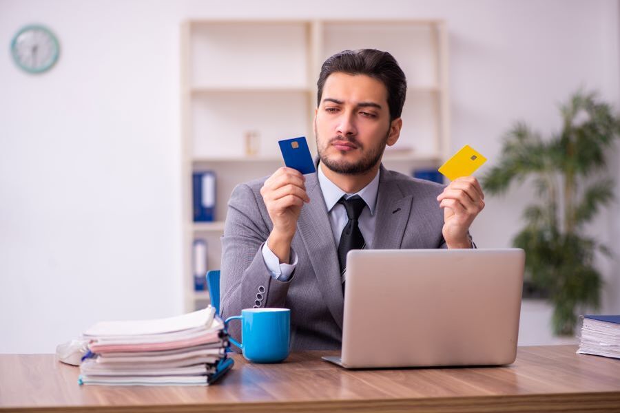 Businessman looking at credit cards