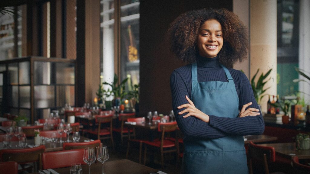 Female Small Business Owner in Restaurant - Ghost Kitchen Concept