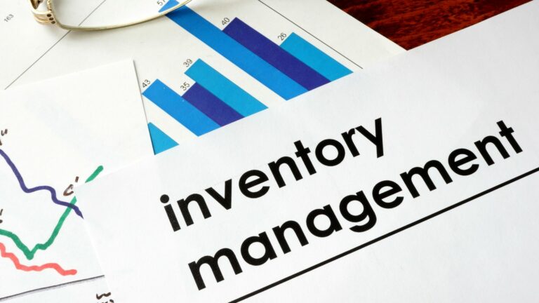 Paper with words inventory management and charts