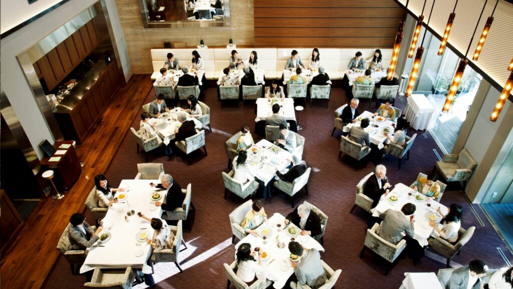 full room with peoples dining in restaurant