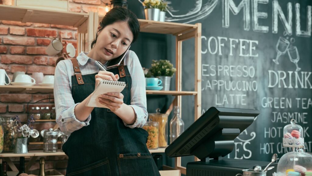 Barista Taking a Mobile Order